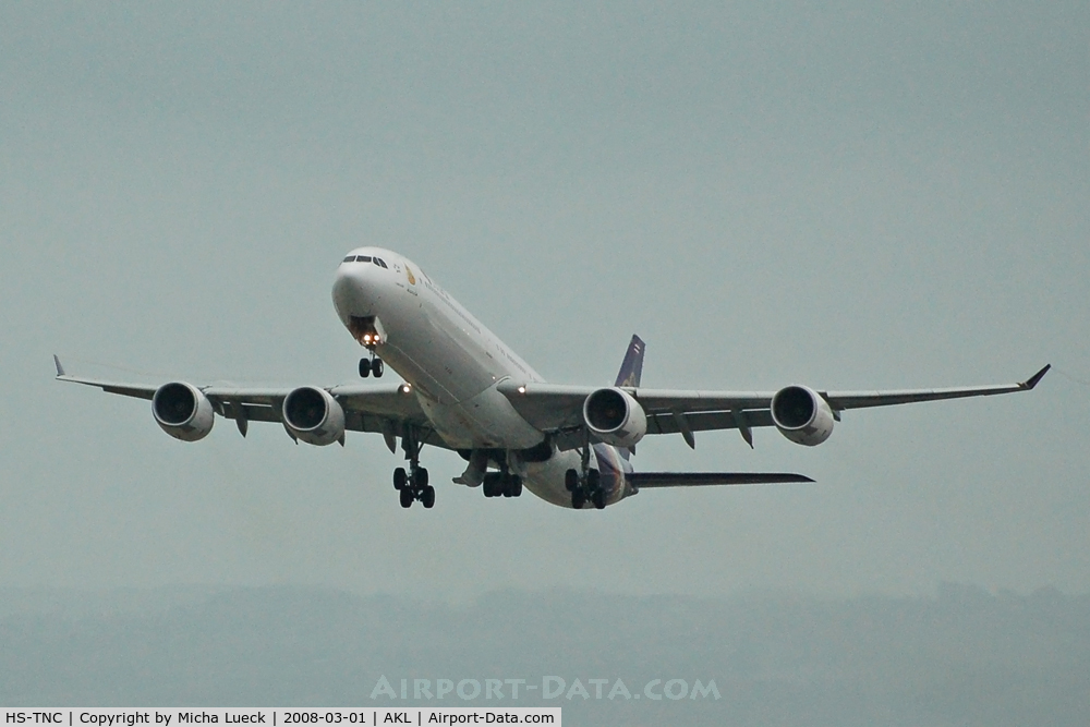 HS-TNC, 2005 Airbus A340-642 C/N 689, Climbing out of Auckland