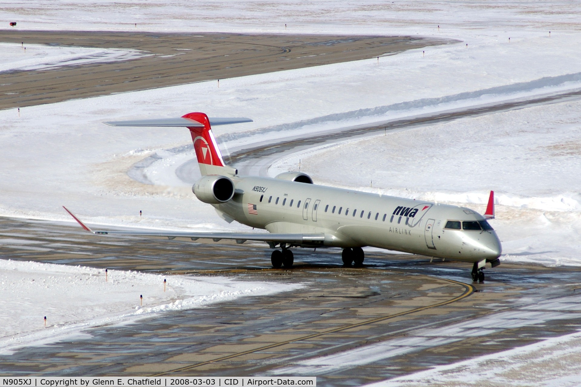 N905XJ, 2007 Bombardier CRJ-900 (CL-600-2D24) C/N 15137, Taxiing off Runway 31 on taxiway D