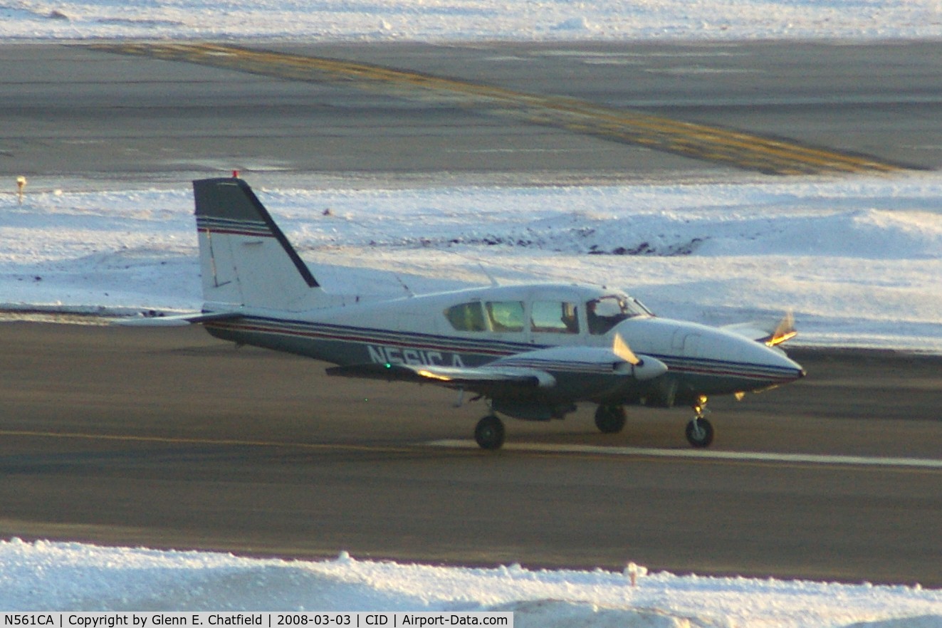 N561CA, 1976 Piper PA-23-250 Aztec C/N 27-7754005, Rolling out on Runway 31, just crossing Runway 27, at sunset