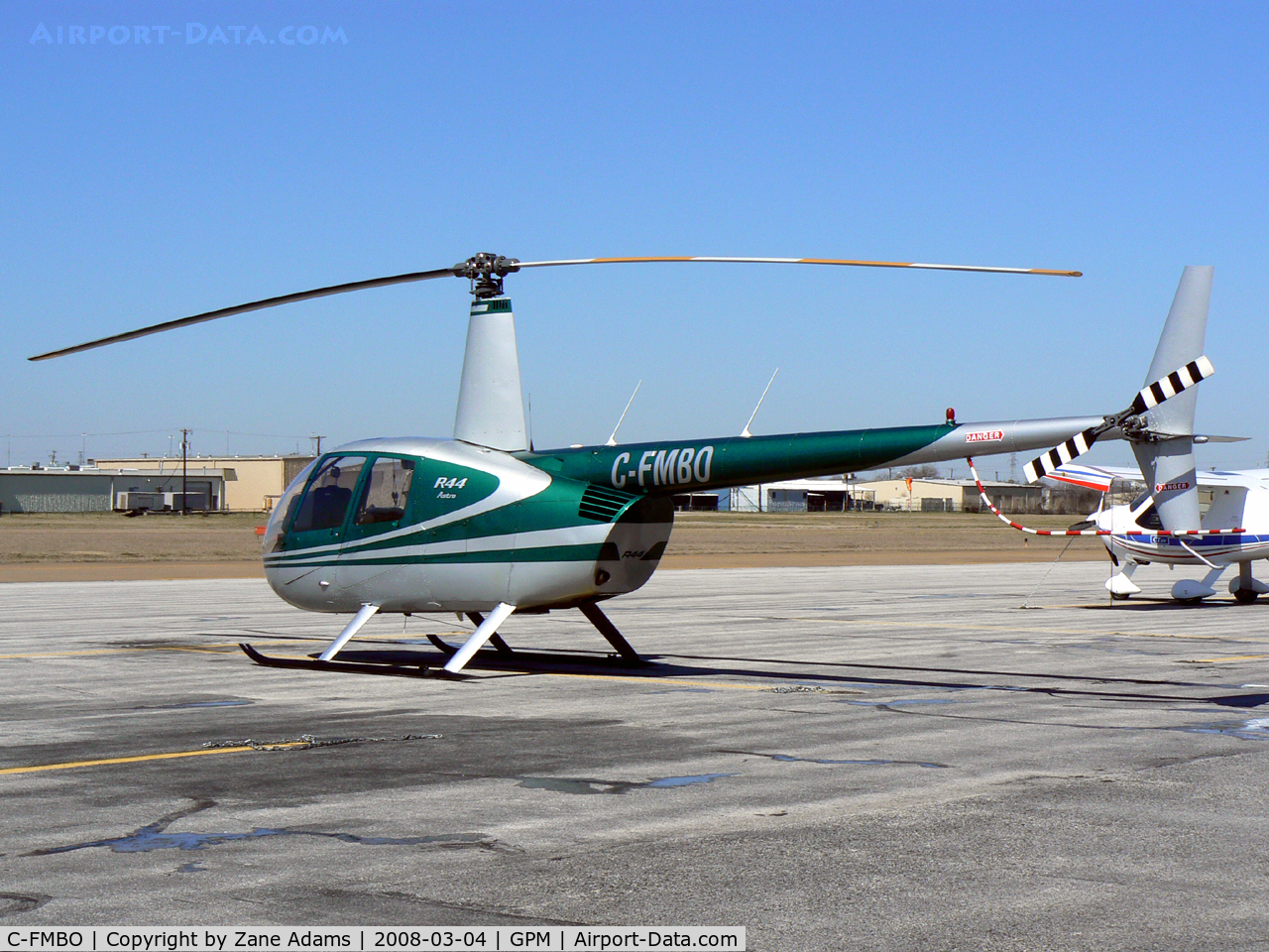 C-FMBO, 1994 Robinson R44 C/N 0106, At Grand Prairie Municipal