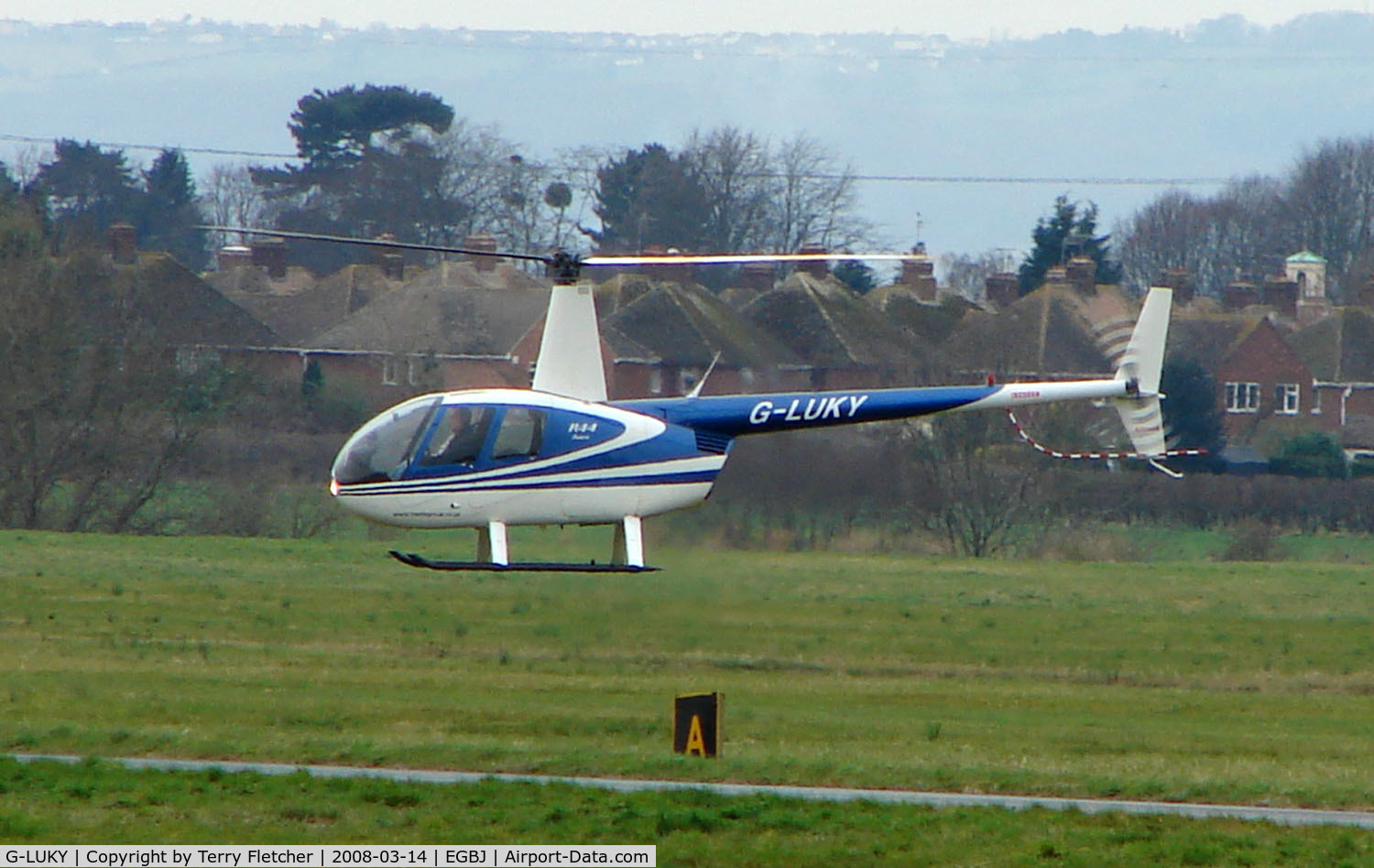 G-LUKY, 1997 Robinson R44 Astro C/N 0357, A visitor to Gloucestershire Airport on the day of the horse racing Gold Cup  at the nearby Cheltenham Racecourse