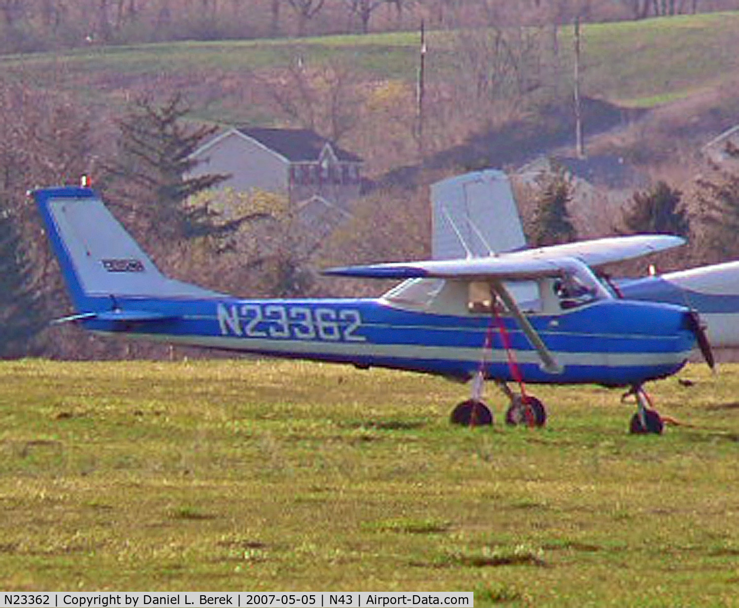 N23362, 1968 Cessna 150H C/N 15068903, Bright blue Cessna shimmers in the evening summer haze.