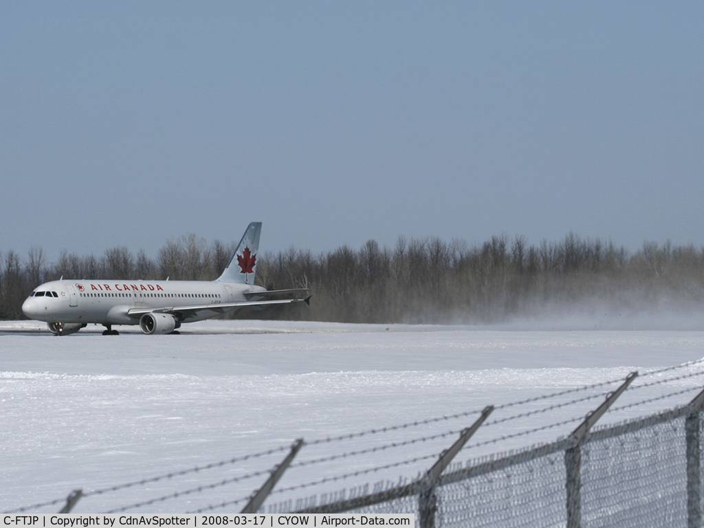 C-FTJP, 1991 Airbus A320-211 C/N 233, This Air Canada A320 is dusting the snow off the runway