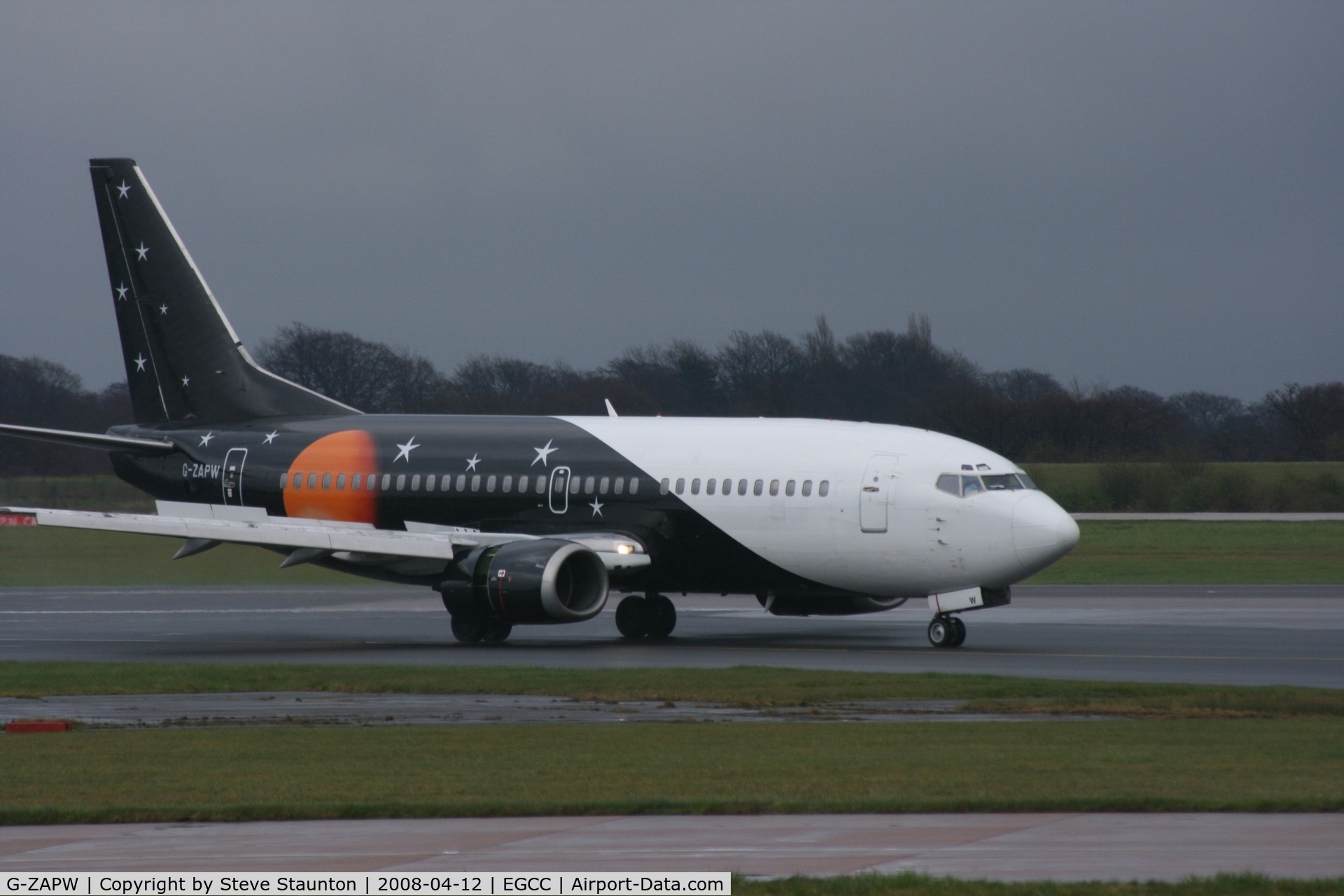 G-ZAPW, 1988 Boeing 737-3L9 C/N 24219, Taken at Manchester Airport on a typical showery April day