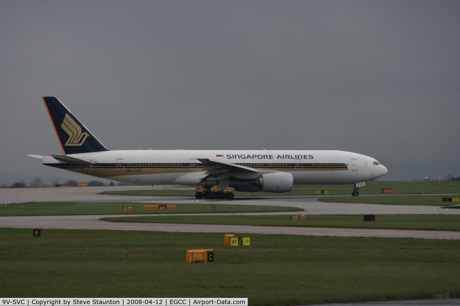 9V-SVC, 2001 Boeing 777-212/ER C/N 28526, Taken at Manchester Airport on a typical showery April day