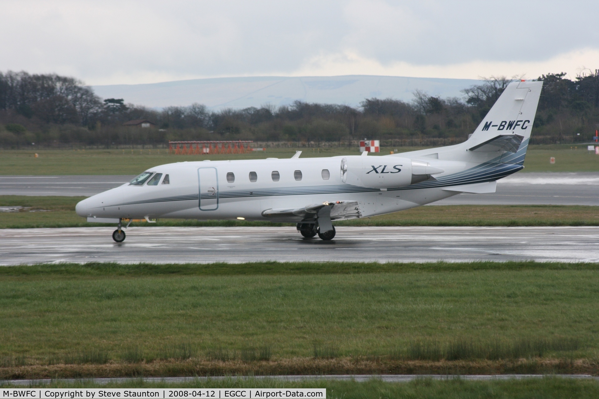 M-BWFC, Cessna 560XL Citation XLS C/N 560-5690, Taken at Manchester Airport on a typical showery April day
