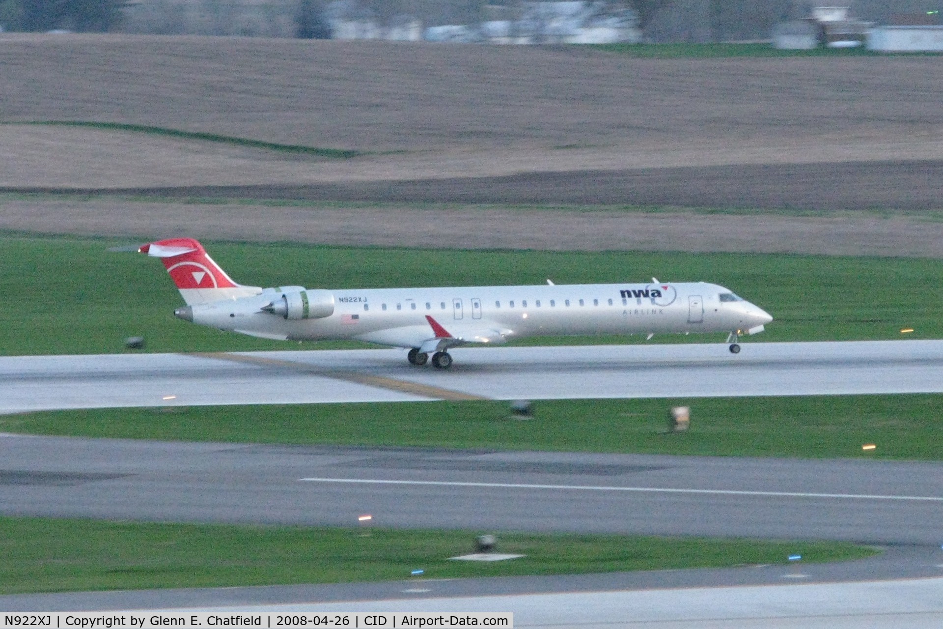 N922XJ, 2008 Bombardier CRJ-900LR (CL-600-2D24) C/N 15174, Arriving runway 27 after sunset.