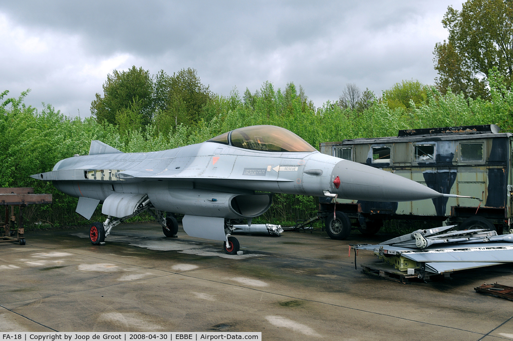 FA-18, 1980 SABCA F-16A Fighting Falcon C/N 6H-18, In 2006 this F-16 was moved from the Weelde storage to Beauvechain to be put on display. Since its arrival nothing has happenend to this aircraft. It's still dismateled in a corner of the air base.