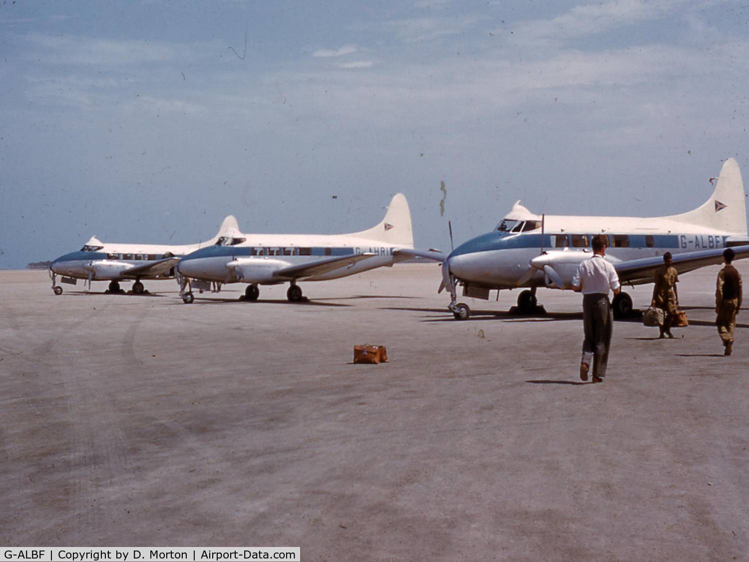 G-ALBF, 1948 De Havilland DH-104 Dove 5 C/N 04152, G-ALBF in the foreground with two other Doves of the Iraq Petroleum Transport Company, Persian Gulf circa 1954
