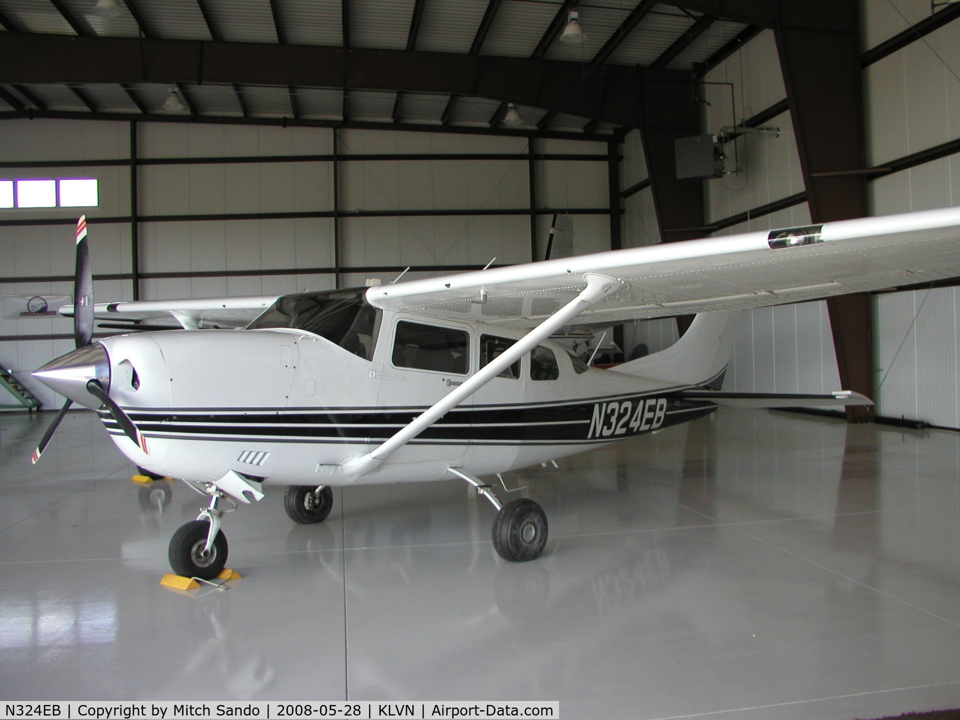 N324EB, 2003 Cessna 206H Stationair C/N 20608190, Parked inside the Aircraft Resource Center hangar.