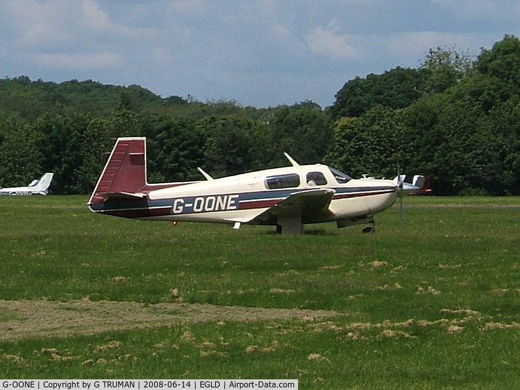 G-OONE, 1987 Mooney M20J 201 C/N 24-3039, Taxing out in the sun