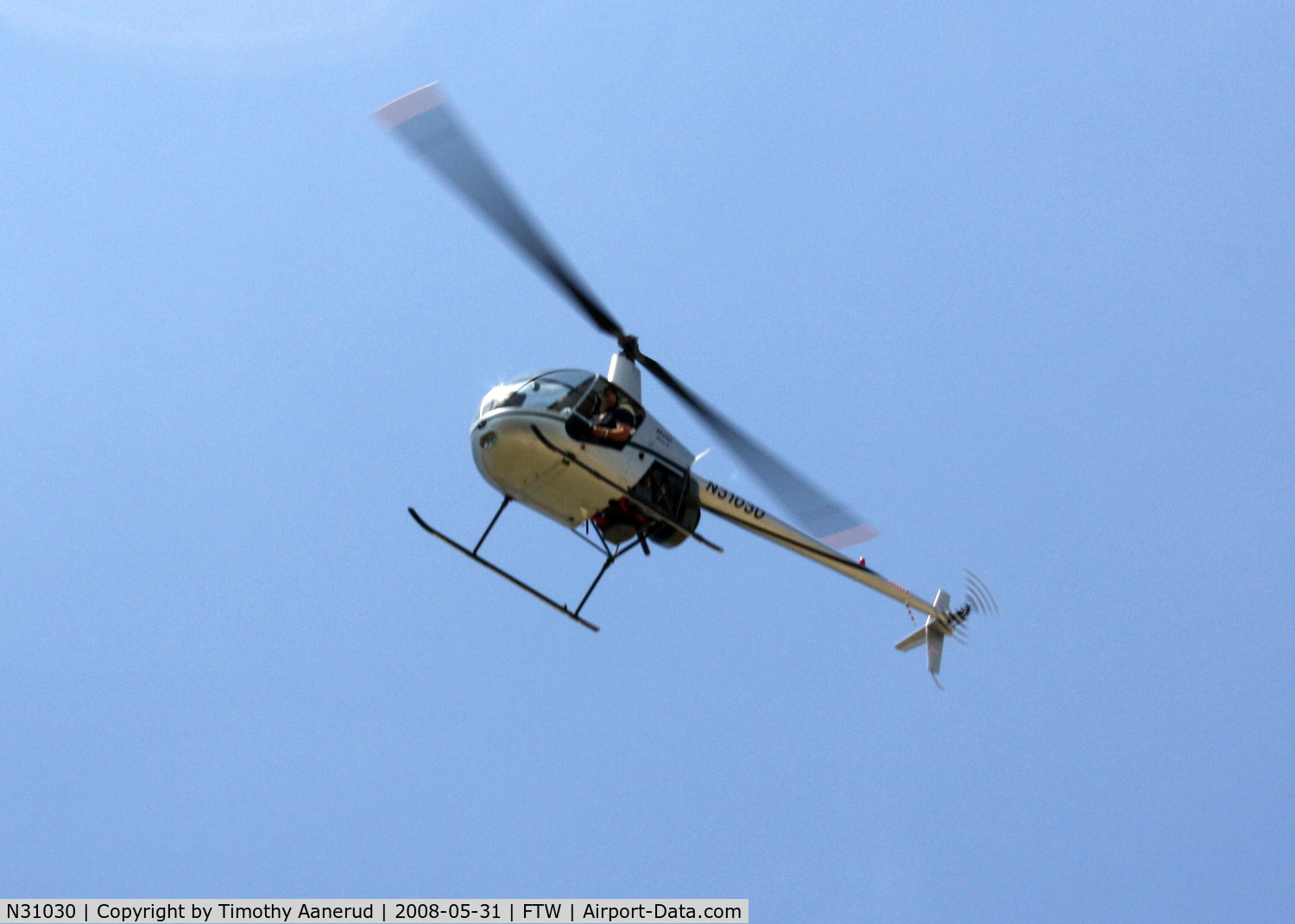 N31030, 2006 Robinson R22 Beta C/N 4059, Flying past the Cowtown Warbird Roundup