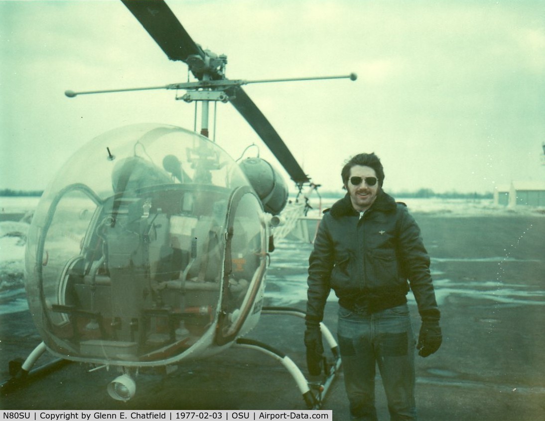 N80SU, 1959 Bell OH-13H C/N 2522, Bell OH-13F, 59-4939 with the Ohio State University Flight Department.  Having just landed and shut down, the guy I took flying took this shot of me with his Polaroid.