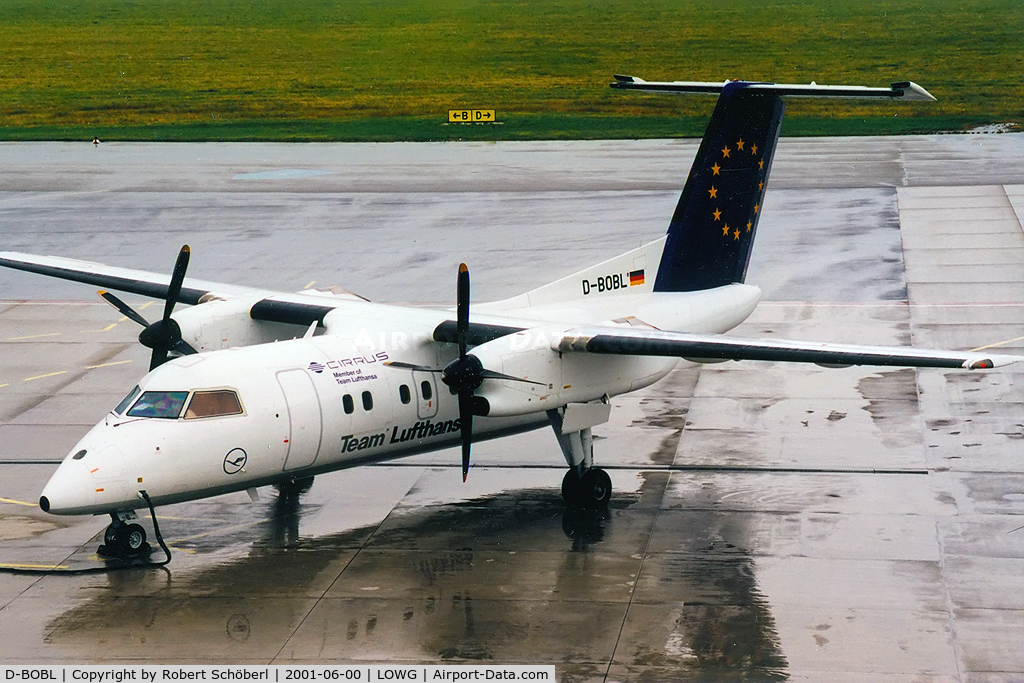 D-BOBL, 1990 De Havilland Canada DHC-8-102 Dash 8 C/N 225, Rainy day at LOWG