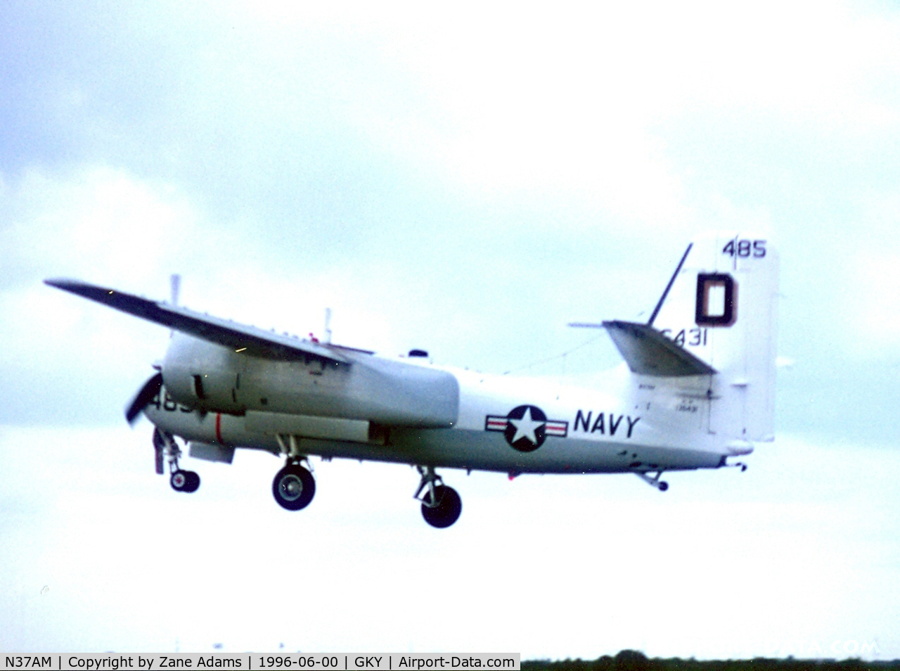N37AM, 1959 Grumman US-2B Tracker (G89) C/N 340, Approaching storms causes a fast departure from Arlington Municipal Open House
