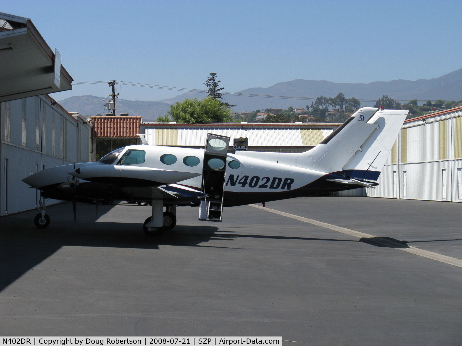 N402DR, 1967 Cessna 402 C/N 402-0047, 1967 Cessna 402, two Continental TSIO-520-VBs 325 Hp each, airstair door open, cargo door closed