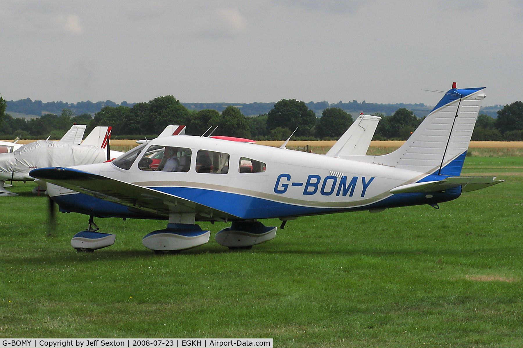 G-BOMY, 1982 Piper PA-28-161 Cherokee Warrior II C/N 28-8216049, Taxiing out from flight line at Lashenden/Headcorn