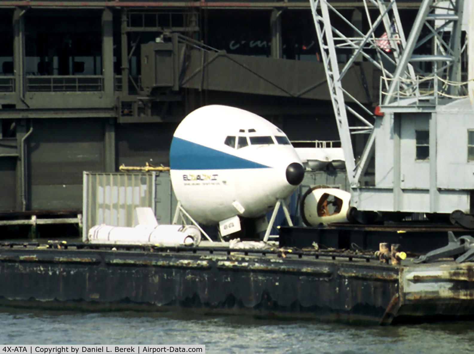 4X-ATA, 1961 Boeing 707-458 C/N 18070/205, Perched on a barge in New York harbor, the preserved nose section of this historic bird awaits transfer to her new home at the Cradle of Aviation Museum.