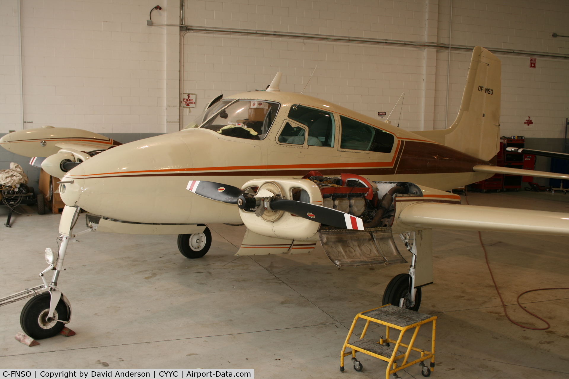 C-FNSO, 1957 Cessna 310 C/N 35535, Undergoing maintenance at YYC