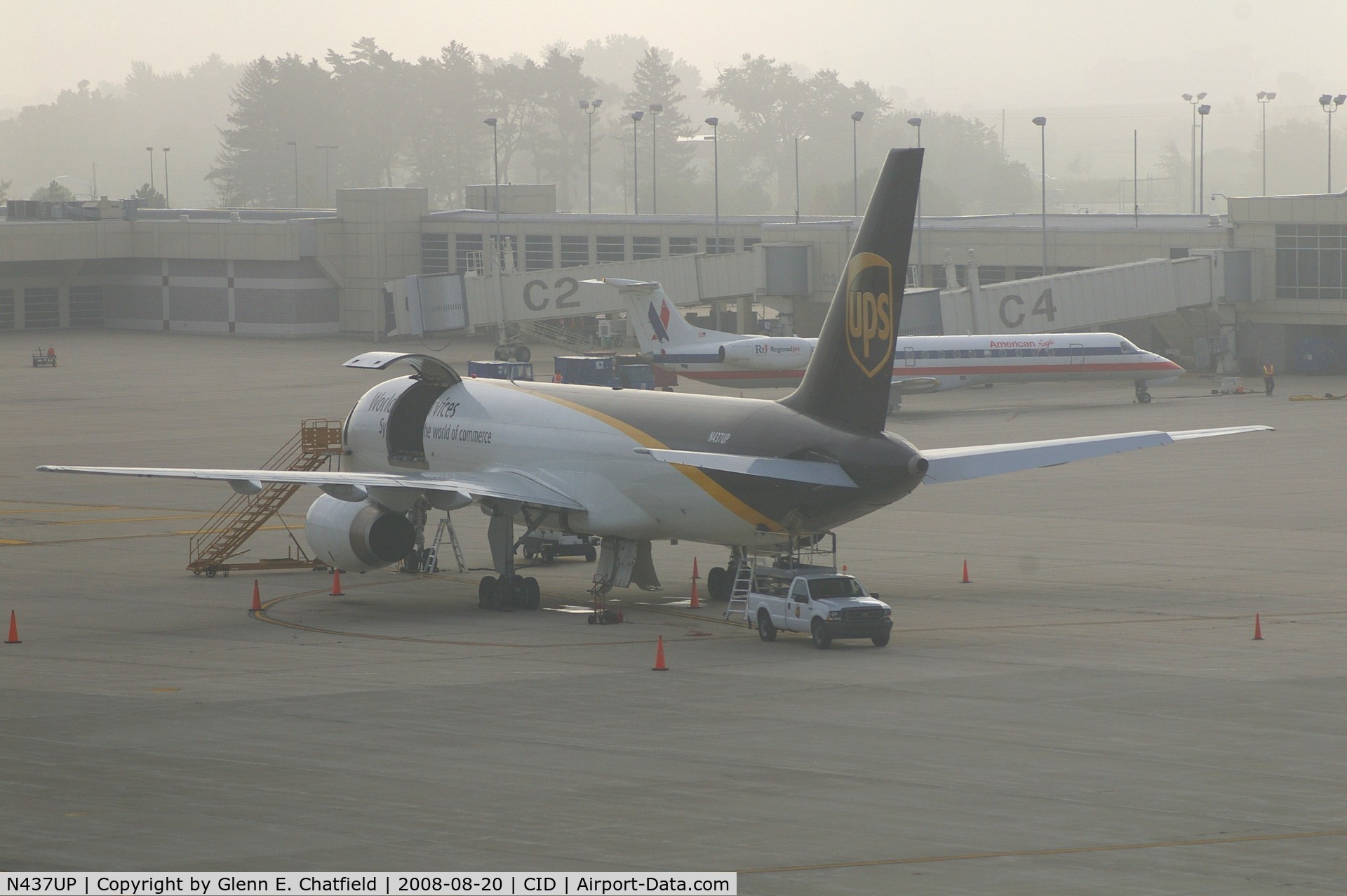N437UP, 1994 Boeing 757-24APF C/N 25468, Early morning fog on the UPS ramp.  Fog is clearing