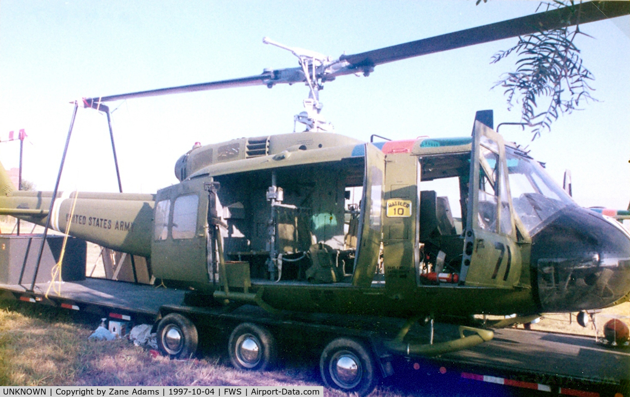 UNKNOWN, , UH-1H Vietnam helicopter traveling display.