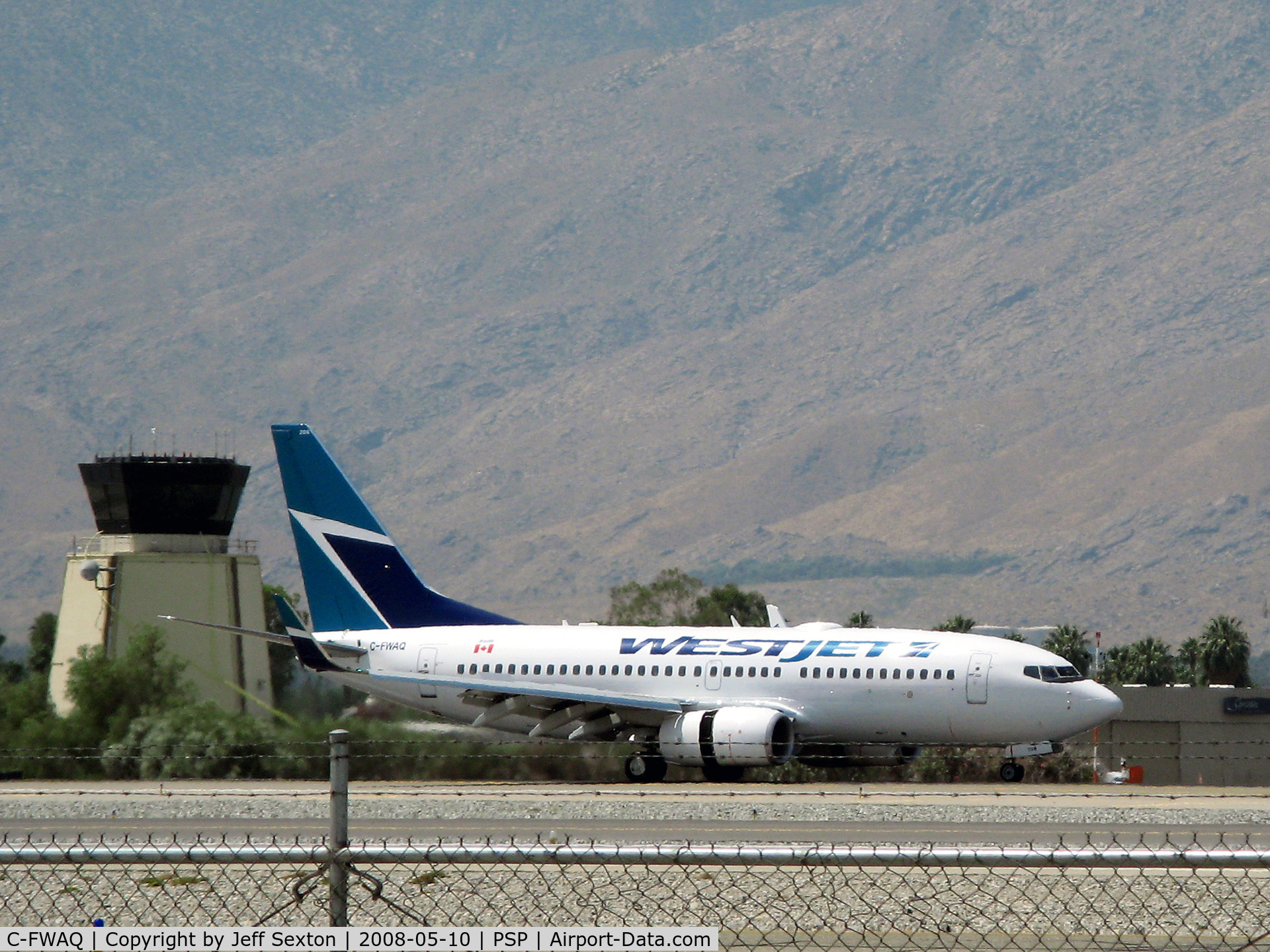 C-FWAQ, 2002 Boeing 737-7CT C/N 32748, Landing at Palm Springs International
