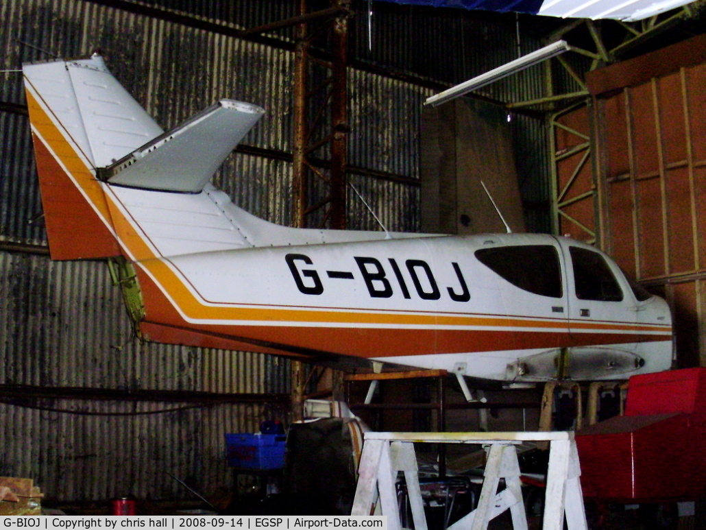 G-BIOJ, 1977 Rockwell Commander 112TCA C/N 13192, inside the main hangar at Sibson