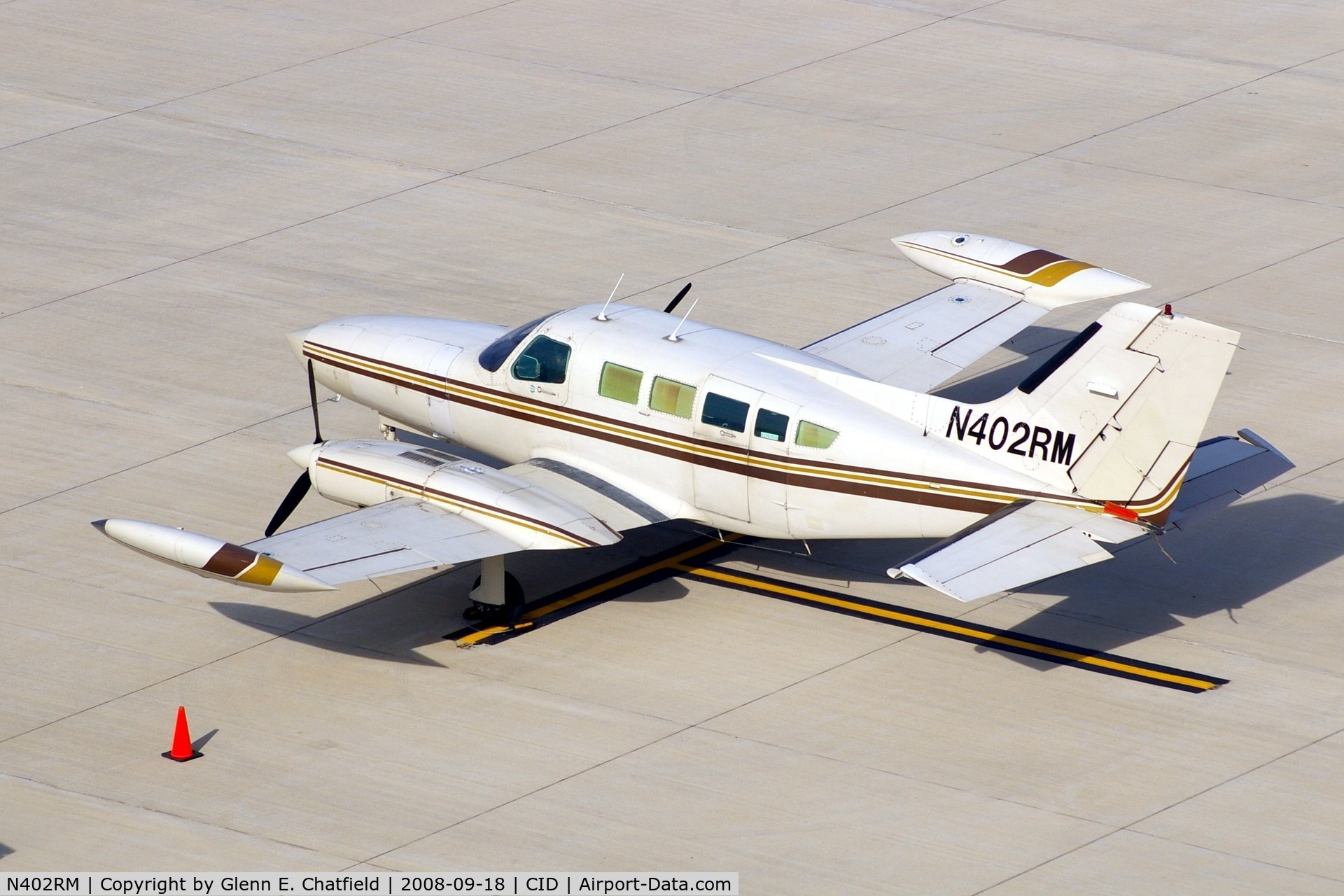 N402RM, 1974 Cessna 402B C/N 402B0607, Parked on the Landmark Ramp.