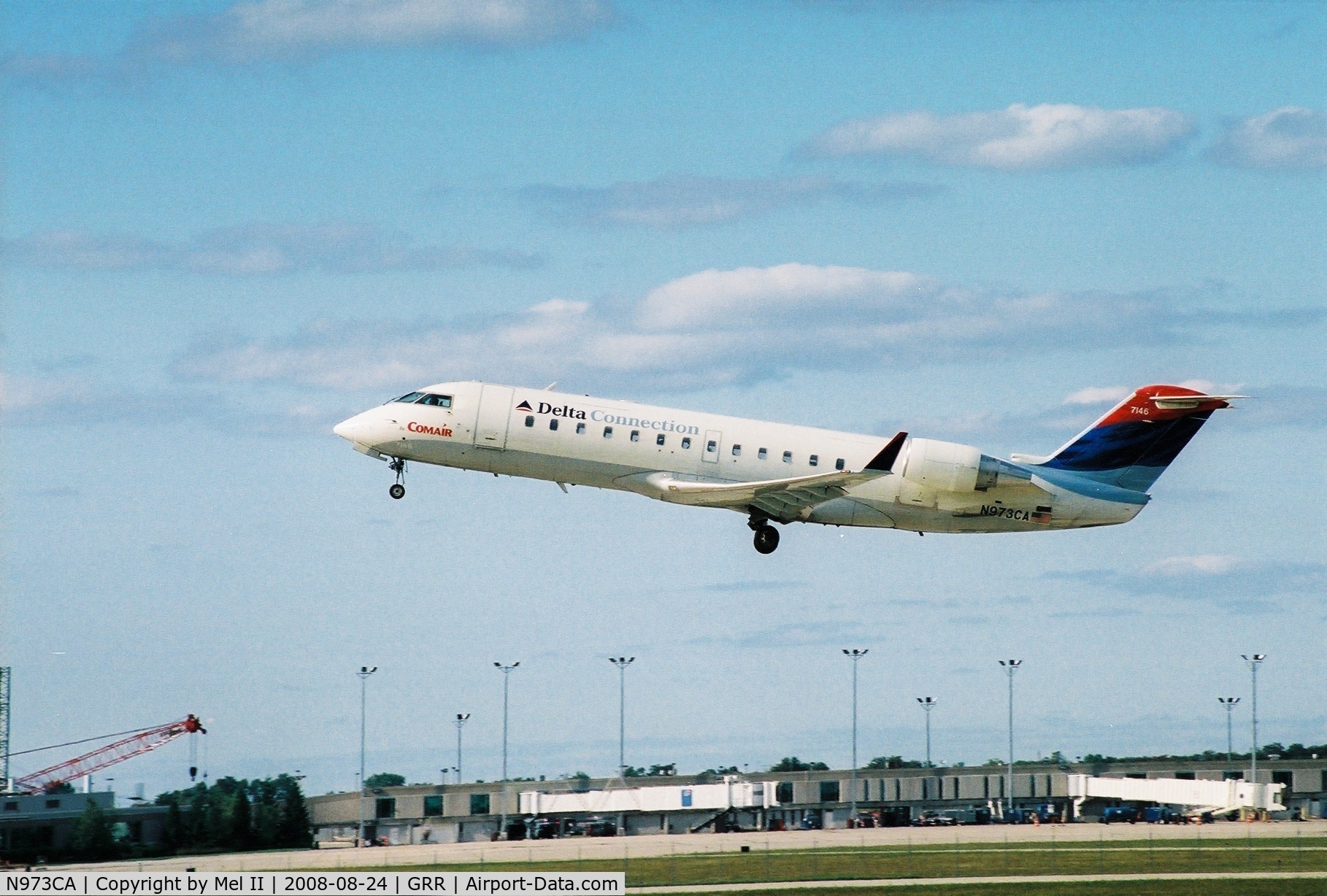 N973CA, 1996 Canadair CL-600-2B19 Regional Jet CRJ-100ER C/N 7146, COM604 - GRR-CVG - Departing RWY 26L
