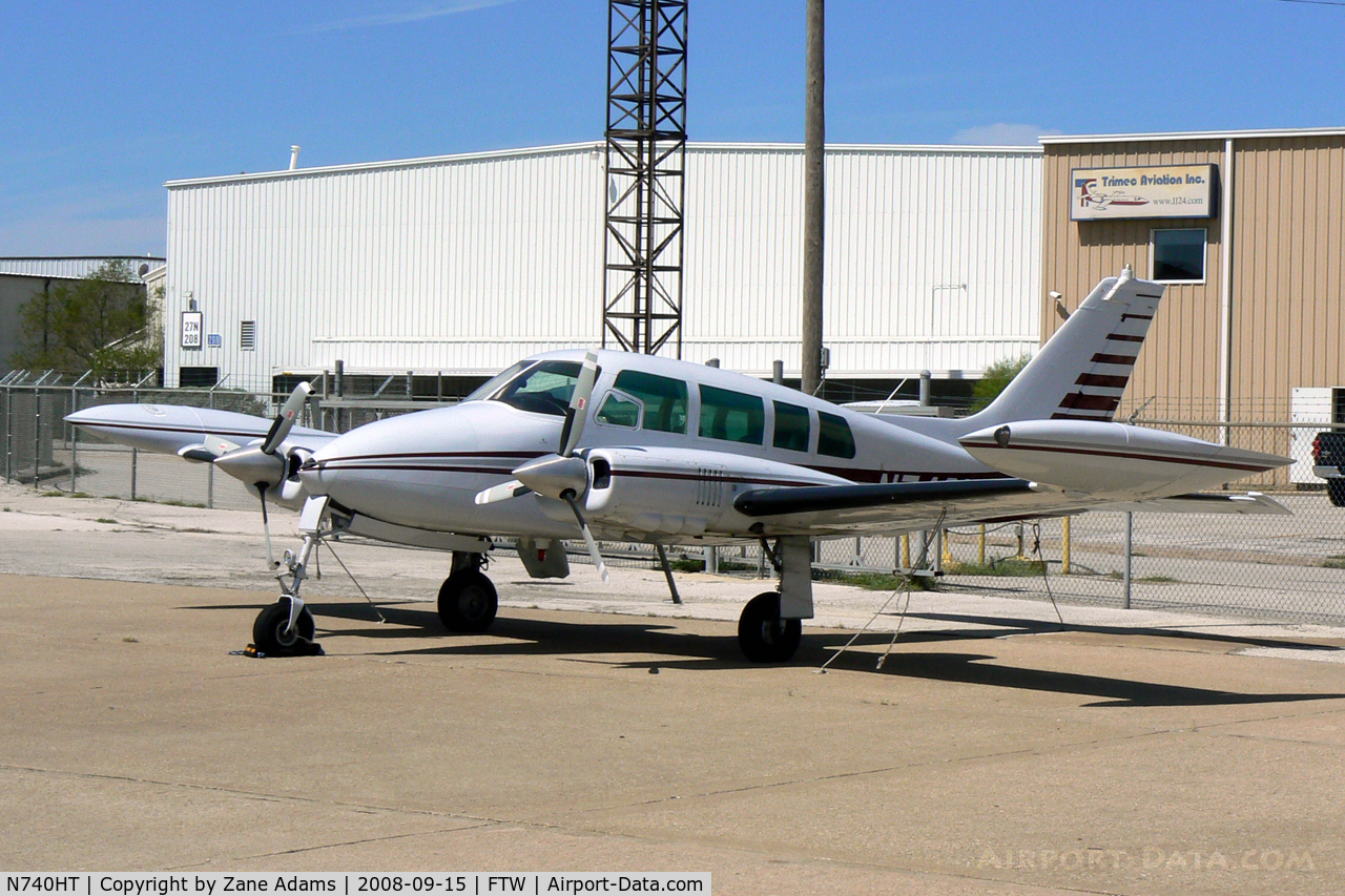 N740HT, 1964 Cessna 320C Skyknight C/N 320C0038, At Meacham Field - Prop damage on right side