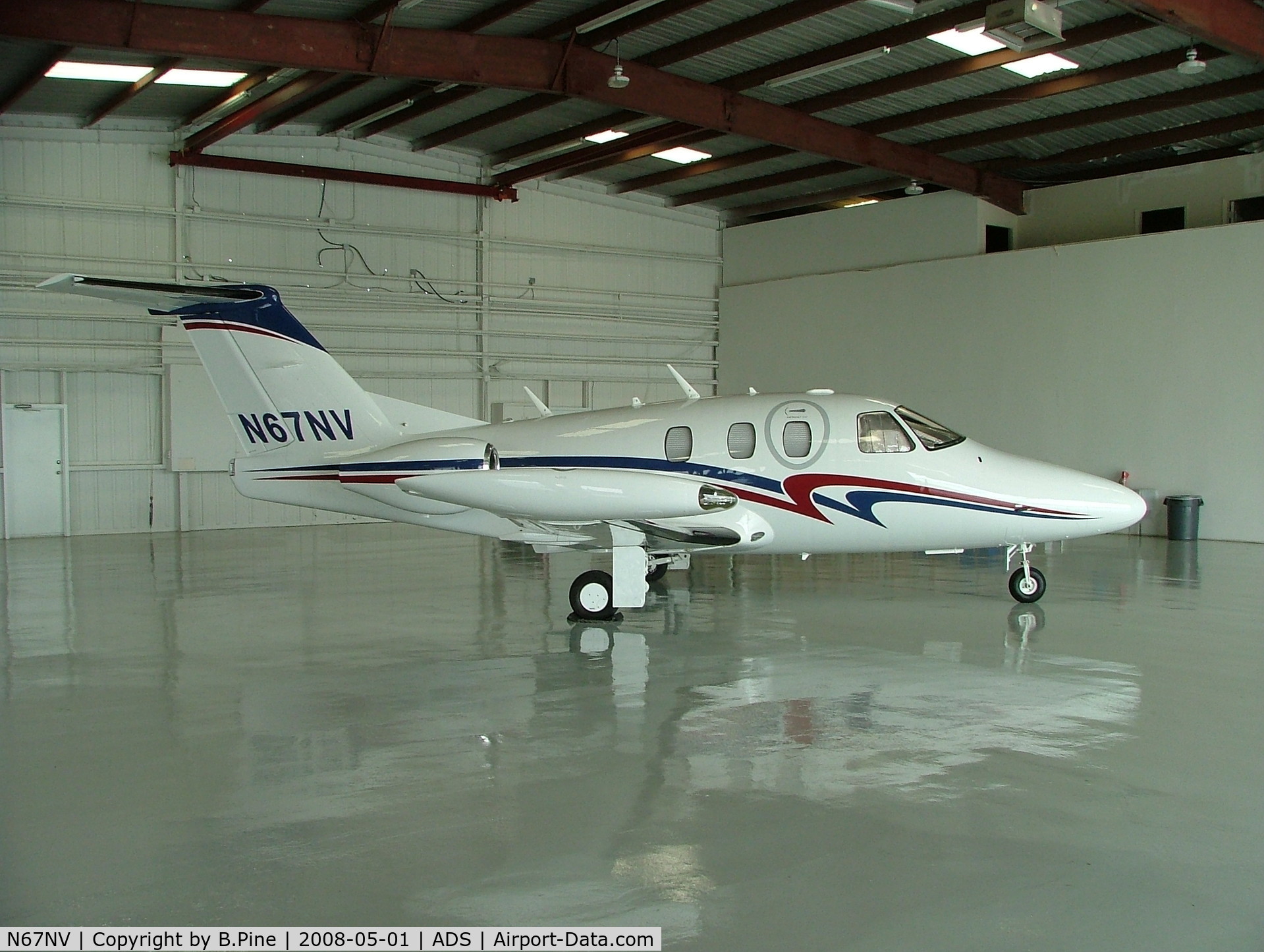 N67NV, 2008 Eclipse Aviation Corp EA500 C/N 000131, In a Hanger at Addison, TX