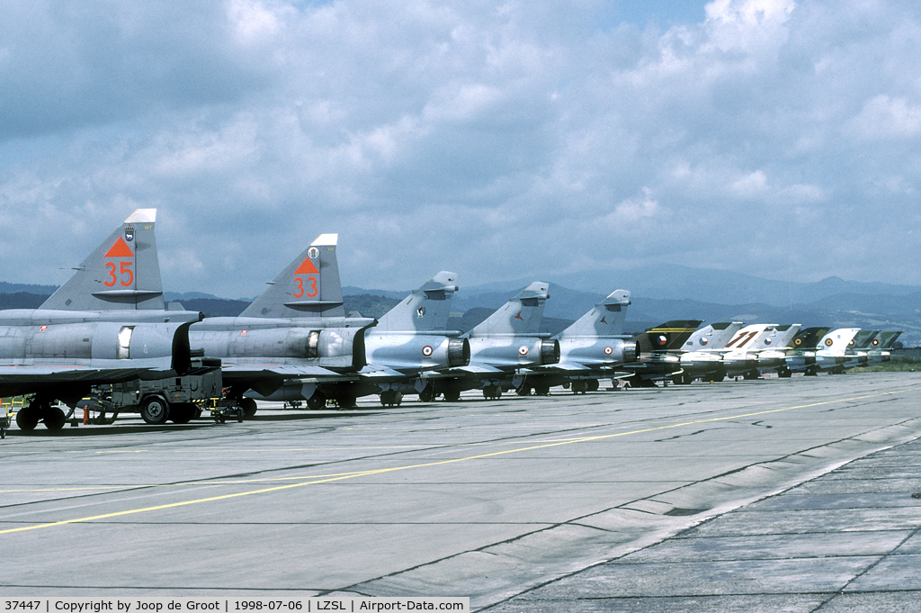 37447, Saab JA 37D Viggen C/N 37447, A wide array of fighters was present during Co-operative Key 1998. Behind the Viggens there are three French Mirage 2000C, four Czech MiG-21, two Rumanian MiG-21 and two Bulgarian MiG-21.