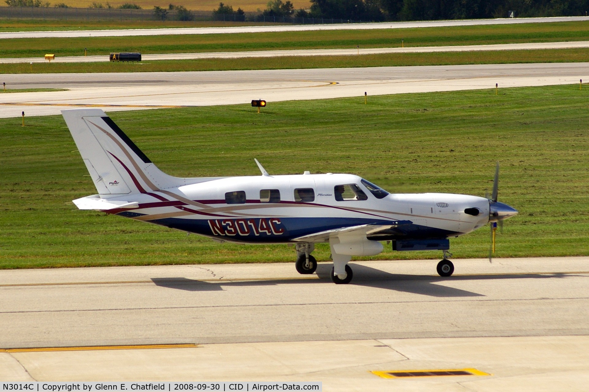 N3014C, 2007 Piper PA-46-500TP C/N 4697311, Taxiing to Landmark FBO, as seen from my office window.