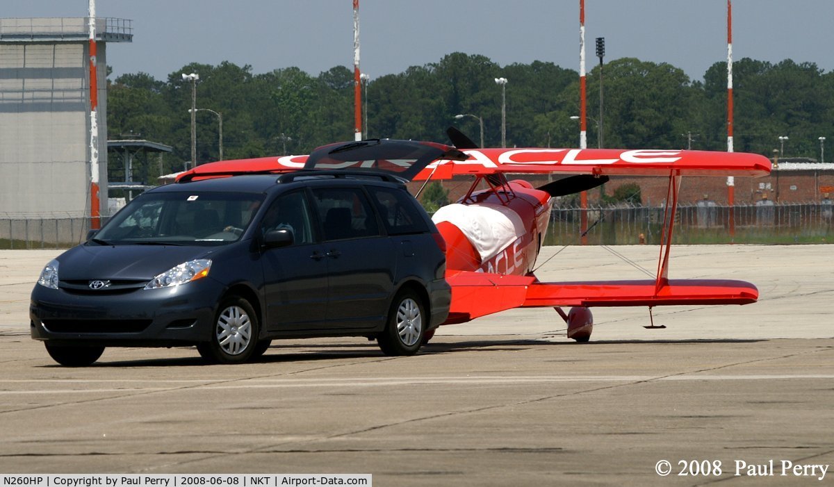 N260HP, 2010 Aviat Pitts S-1S C/N 0001, Being towed in by the minivan