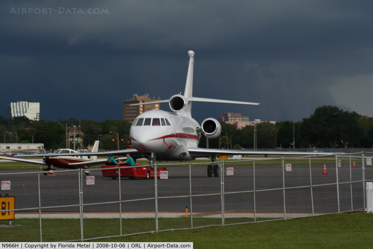 N966H, 2004 Dassault Falcon 900EX C/N 126, Falcon 900EX with storm in background