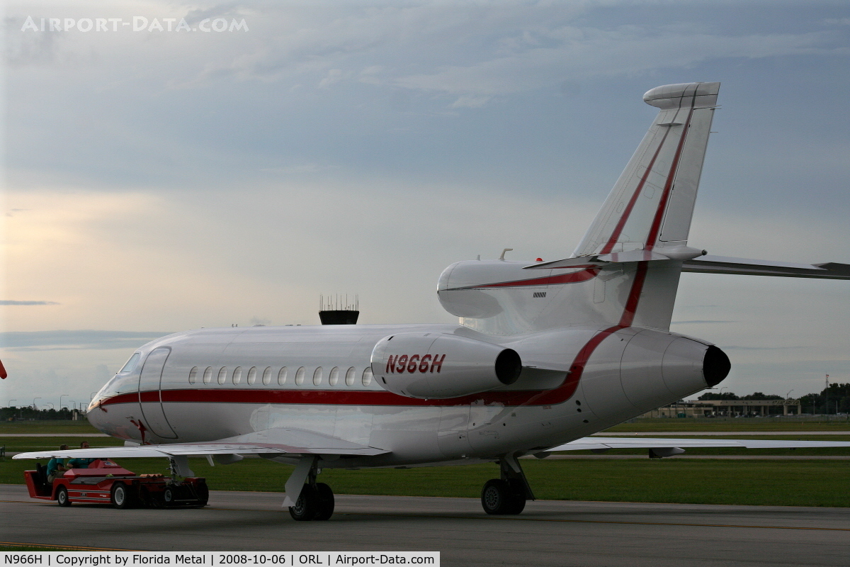 N966H, 2004 Dassault Falcon 900EX C/N 126, Falcon 900EX with storm in background