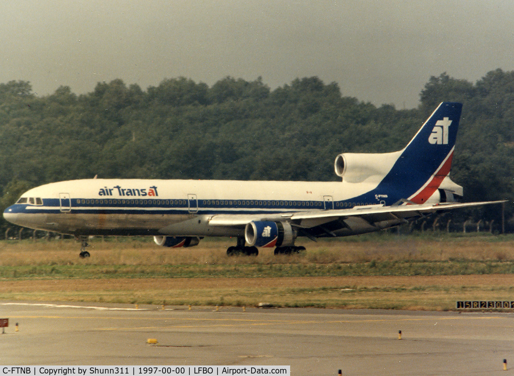 C-FTNB, 1972 Lockheed L-1011-385-1-14 TriStar 150 C/N 193A-1010, Landing rwy 14R and reverses engaged...