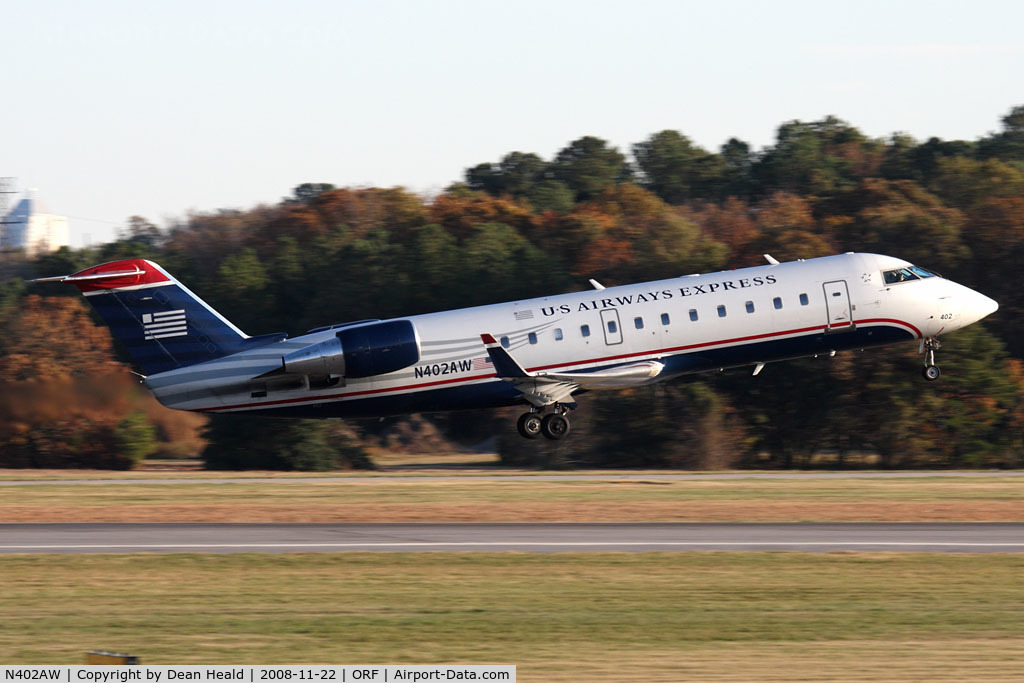 N402AW, 1998 Bombardier CRJ-200LR (CL-600-2B19) C/N 7281, US Airways Express (Air Wisconsin) N402AW (FLT AWI3652) departing RWY 23 enroute to Reagan National (KDCA).