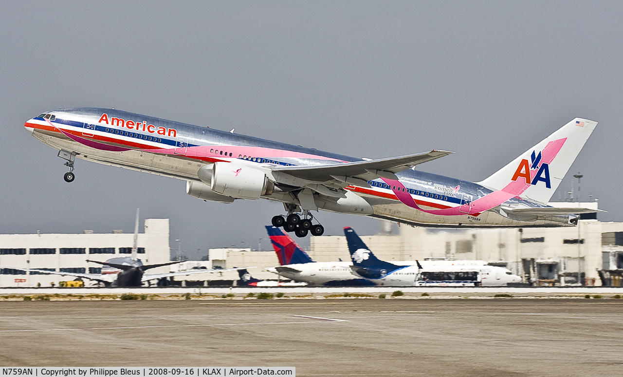 N759AN, 2001 Boeing 777-223/ER C/N 32638, Special scheme for breast cancer taking off from rwy 25R.