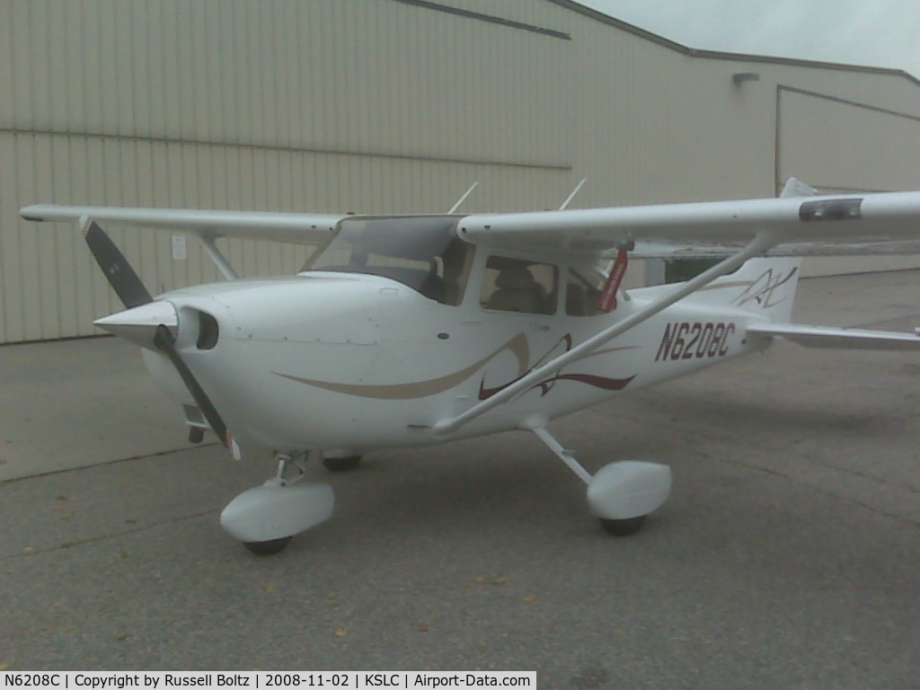 N6208C, 2008 Cessna 172S C/N 172S10820, Parked in front of the hanger