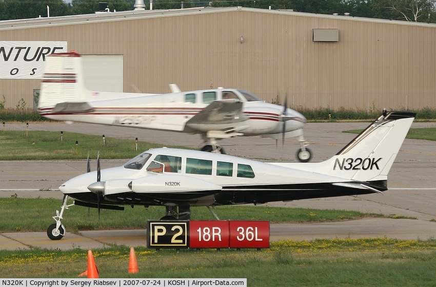 N320K, 1961 Cessna 320 Skyknight C/N 320-0018, EAA AirVenture 2007