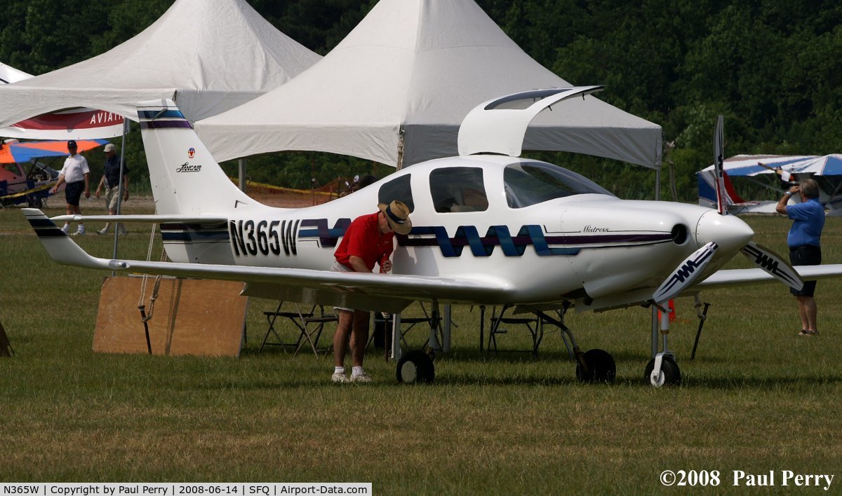 N365W, 1998 Lancair IV-P C/N 002, I like how the corkscrew motif is repeated on the prop blades