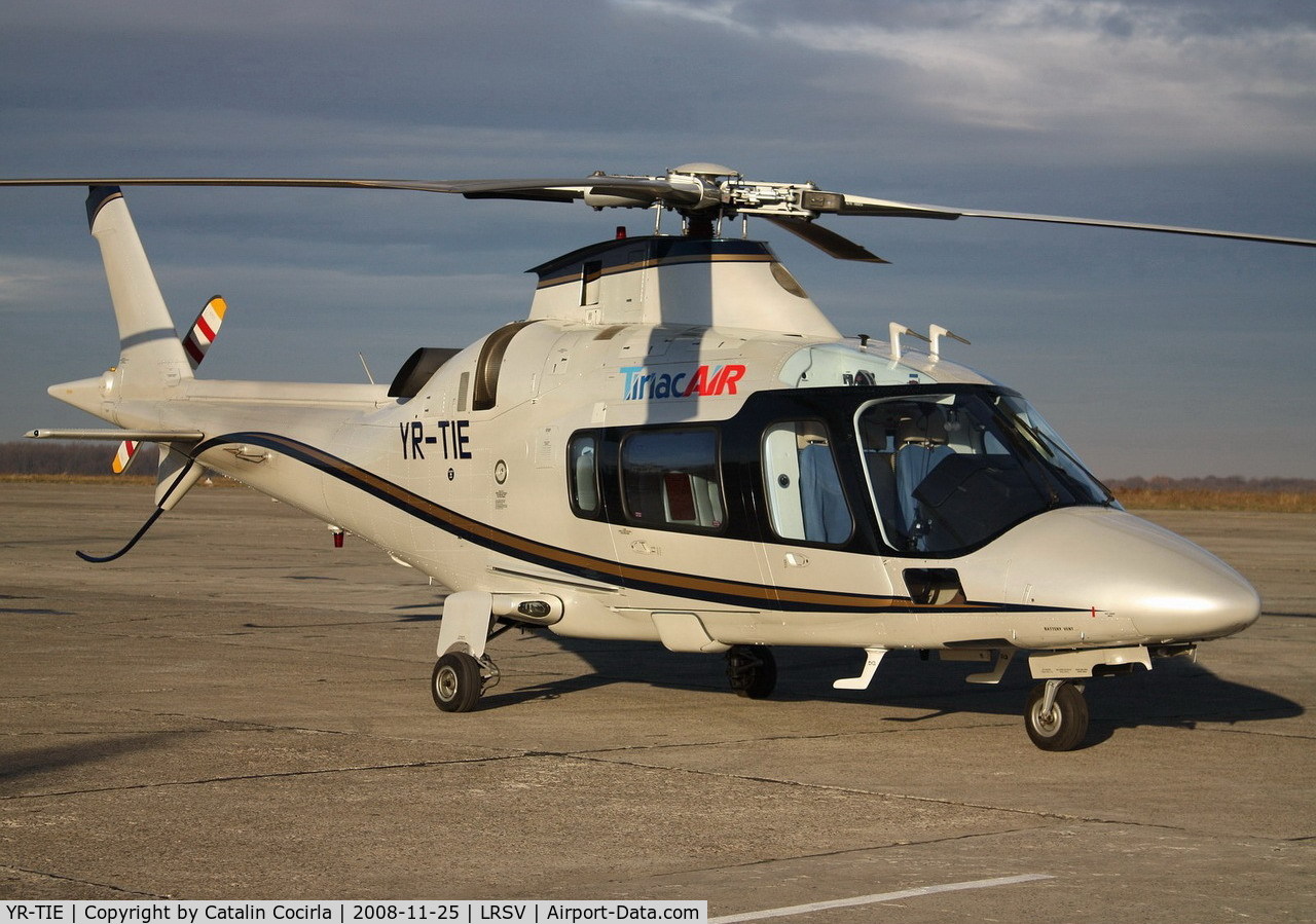 YR-TIE, Agusta A-109E Power C/N 11668, Parked on the apron in front of the terminal