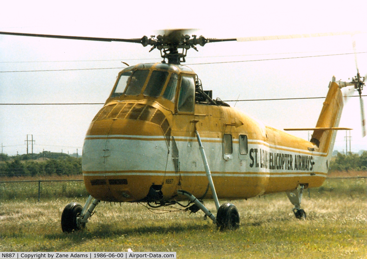 N887, 1957 Sikorsky S-58B C/N 58482, St Louis Helicopter Airways Sikorsky S-58 - Lifting roof top equipment at the General Motors plant in Arlington, TX