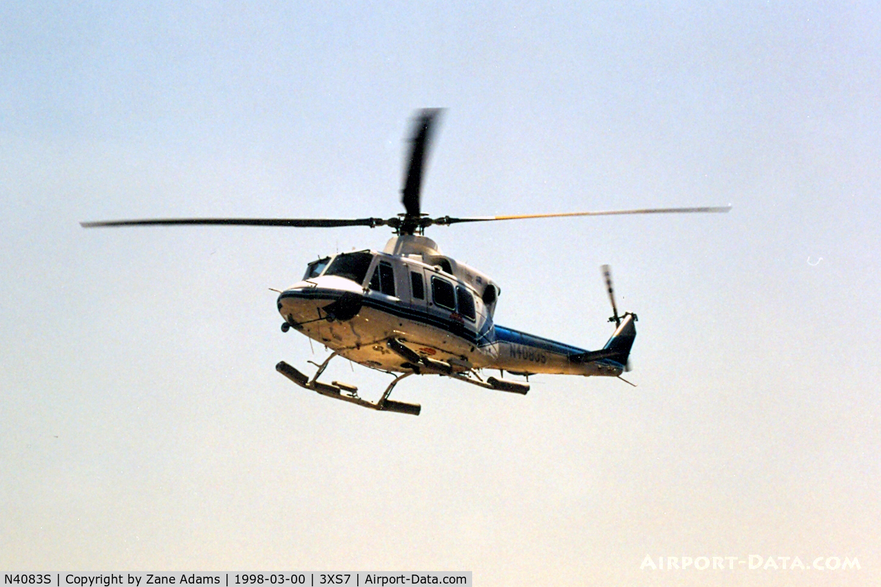 N4083S, 1981 Bell 412 C/N 33028, Bell 412 flying around the track at the 1998 NASCAR Winston Cup Race.