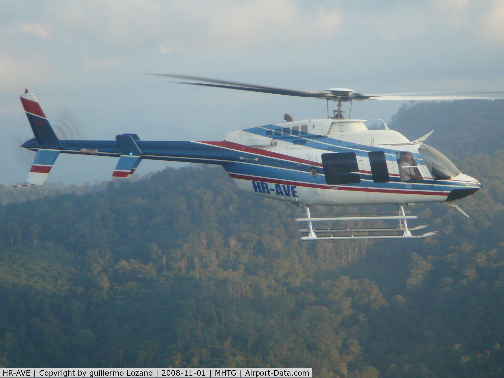 HR-AVE, 1997 Bell 407 C/N Not found HR-AVE, Flying over Tegucigalpa