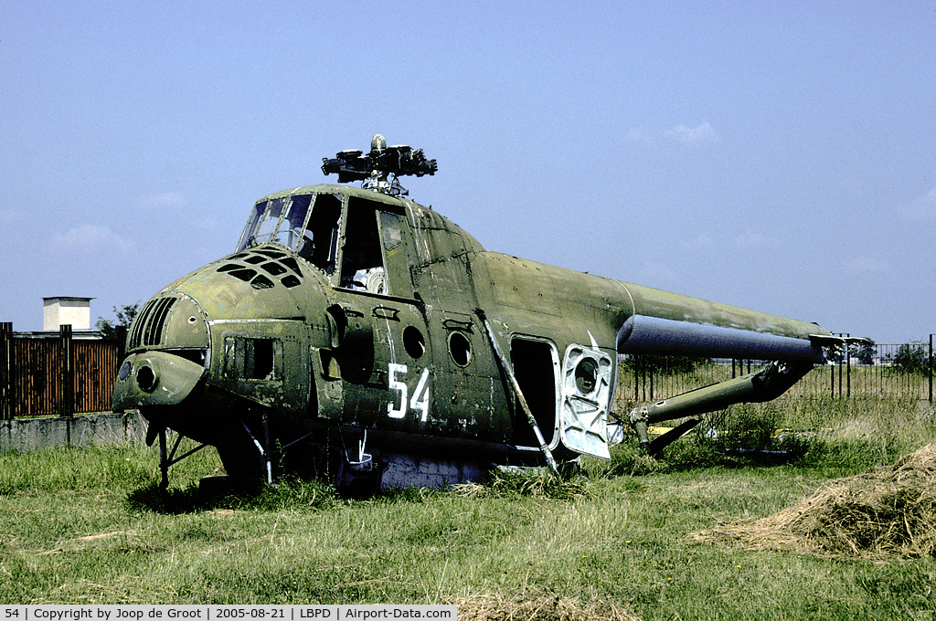 54, 1959 Mil Mi-4 C/N 12112, This helo is in a very bad shape. It's on a dump behind the museum.