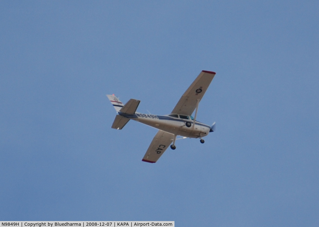 N9849H, 1981 Cessna 182R Skylane C/N 18268068, Civil Air Patrol flying West over Columbine High School, Littleton Colorado.