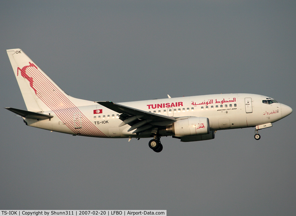 TS-IOK, 1999 Boeing 737-6H3 C/N 29496, Landing rwy 14L...