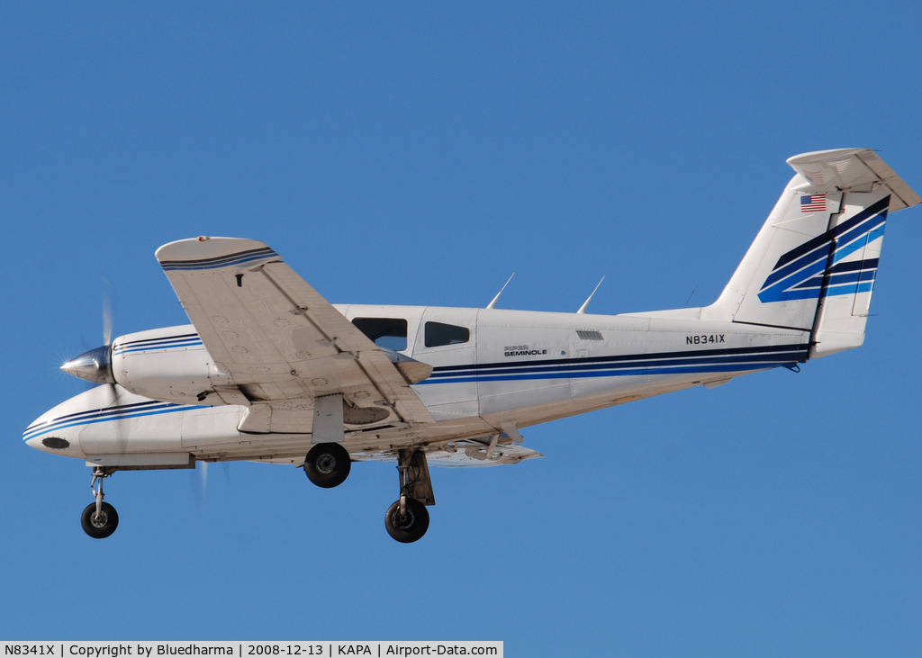 N8341X, Piper PA-44-180T Turbo Seminole C/N 44-8107043, Landing on 17L on a very windy day.